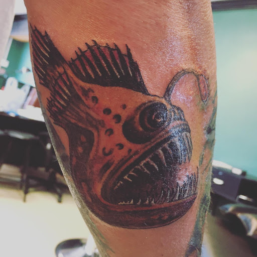 Explore tattoos for son ideas, creative tattoo ideas in Largo, available at Inside Ink Tattoo Studio