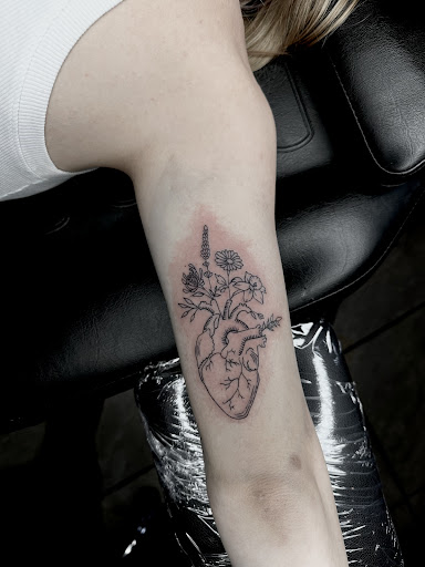 Explore back thigh tattoo ideas, creative tattoo ideas in Zephyrhills, available at The Tattoo Haven