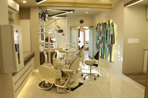 Dr Tanay Dhopte | Nital Aesthetics | Best Dentist In Vadodara image