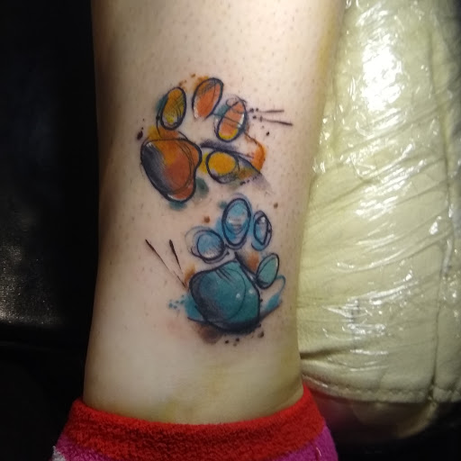 Explore upper arm tattoo ideas for men, creative tattoo ideas in Sullivan, available at Double Time Tattoo
