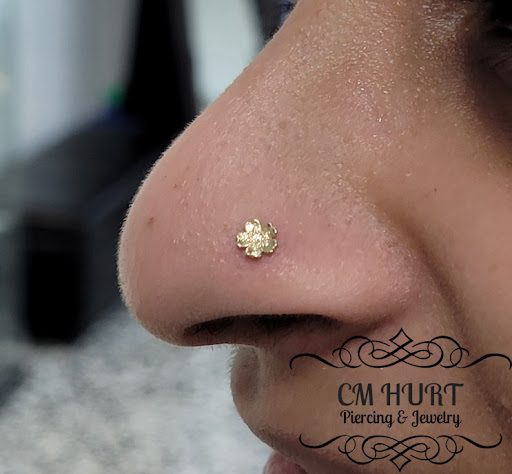 Explore black people tattoo ideas, creative tattoo ideas in Garden Grove, available at CM Hurt Piercing & Jewelry