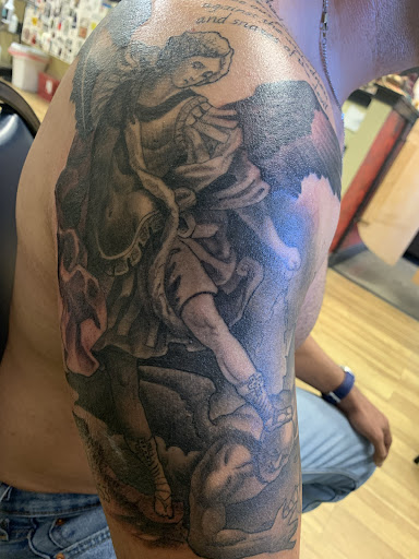 Explore grandson tattoo ideas, creative tattoo ideas in El Paso, available at Red Skull Tattoo