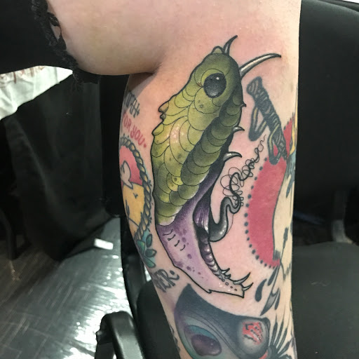 Explore rainbow baby tattoo ideas, creative tattoo ideas in Tallmadge, available at Killjoy tattoo