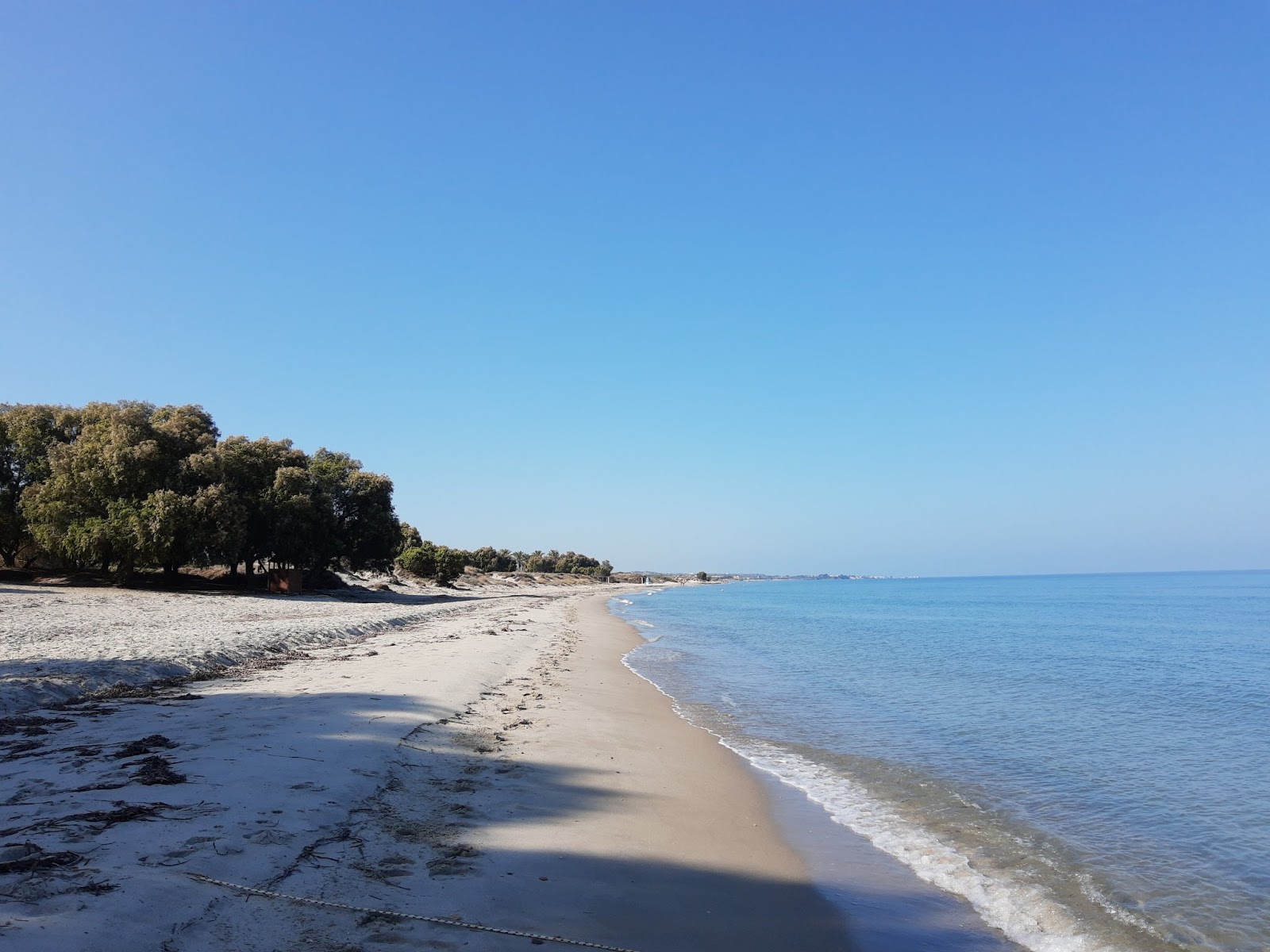 Zdjęcie Marmari beach z powierzchnią jasny piasek