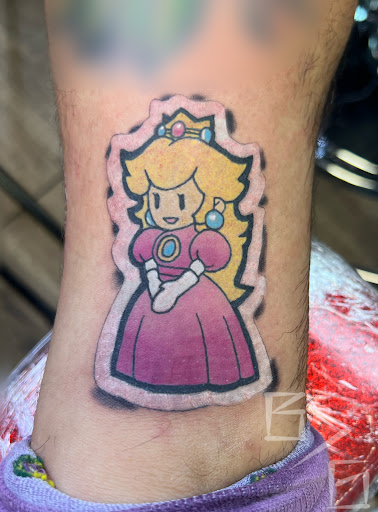 Explore sticker sleeve tattoo ideas, creative tattoo ideas in Miami, available at Black Web Ink Miami