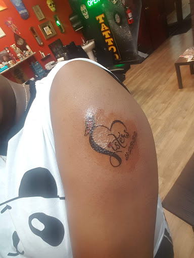 Tattoo Shop «Wicked Owl Studios», reviews and photos, 604 Torrence Ave, Calumet City, IL 60409, USA