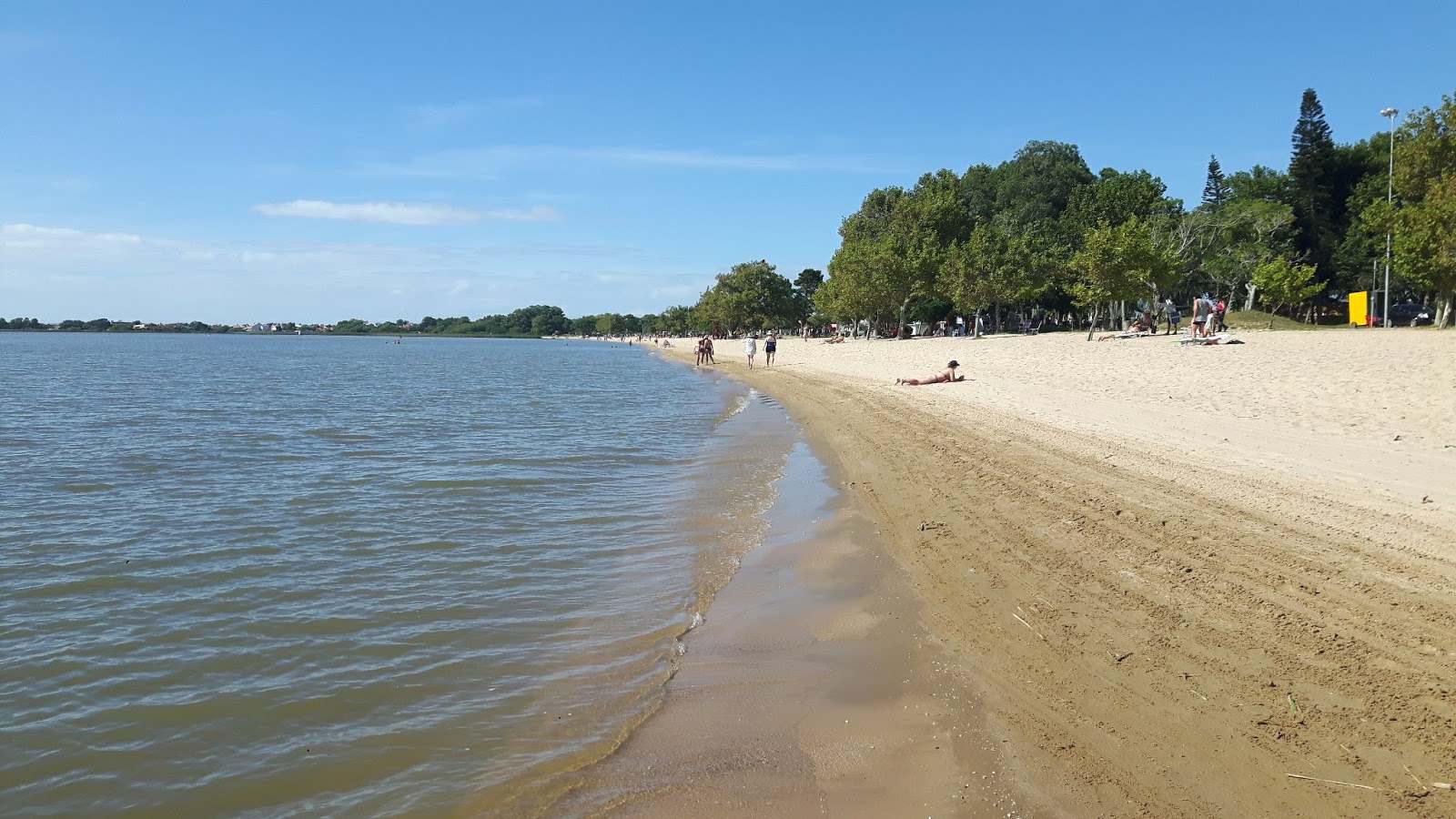 Zdjęcie Praia da Barrinha z powierzchnią jasny piasek