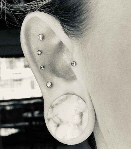 Explore shoulder tattoos ideas, creative tattoo ideas in Davenport, available at Zeitgeist Piercing & Jewelry