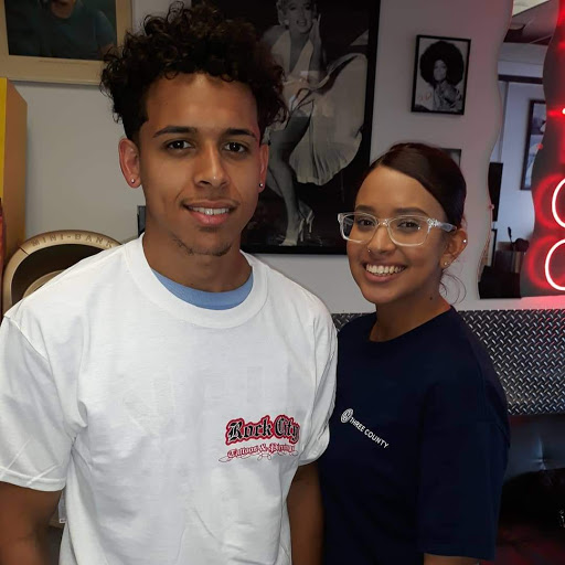 Explore arm tattoo ideas flowers, creative tattoo ideas in Belleville, available at Rock City Tattoos & Body Piercing