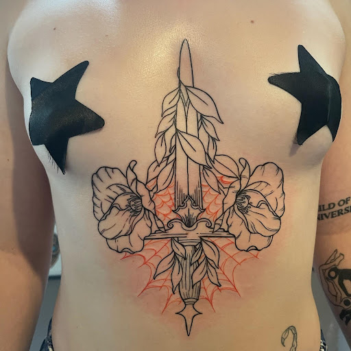 Explore tribal heart tattoo ideas, creative tattoo ideas in Brandon, available at Pinup Tattoo Studio
