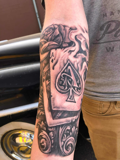 Explore tattoo ideas for writers, creative tattoo ideas in Minocqua, available at Family Tradition Tattoo Co.