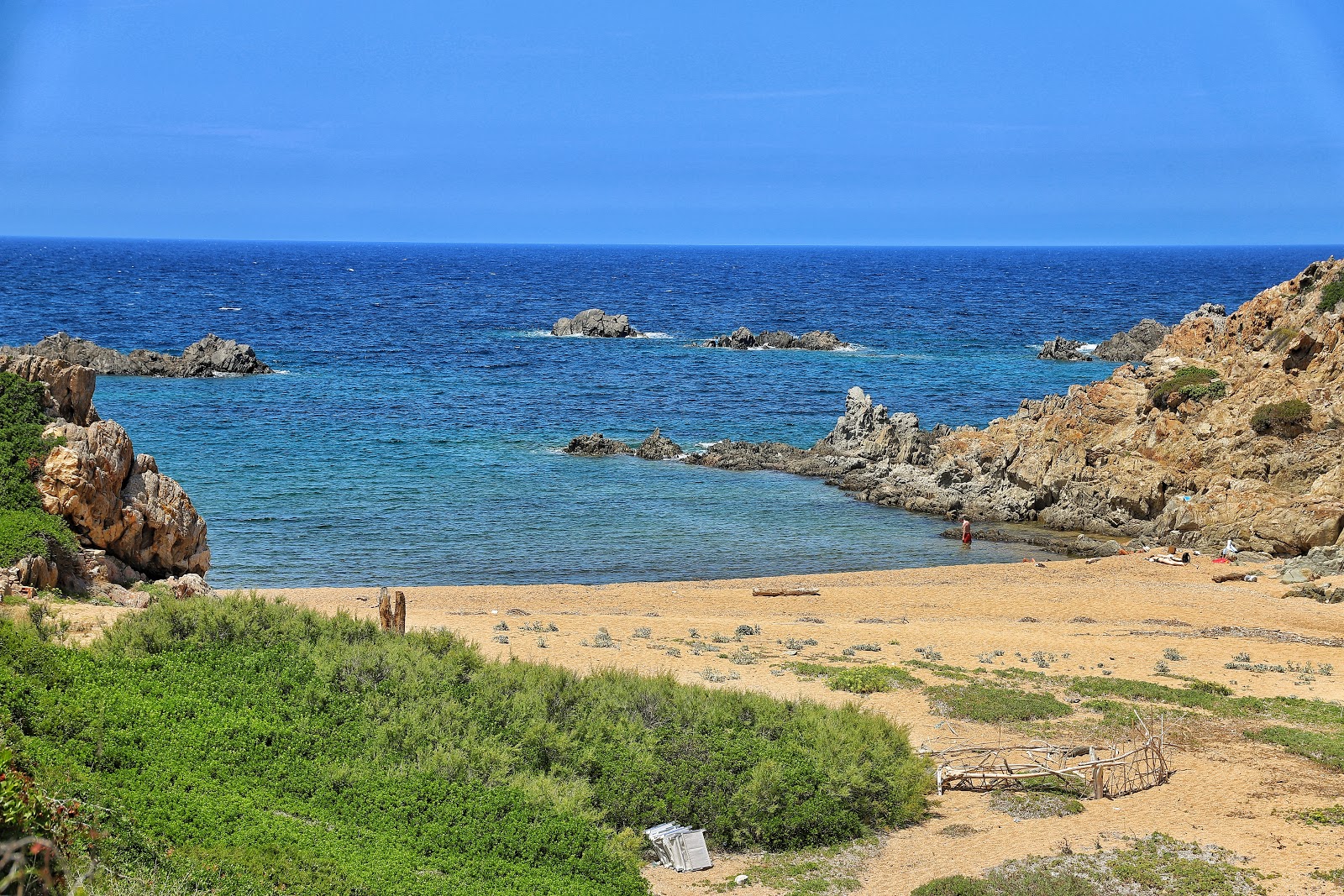 Foto av Spiaggia di Cala Faa med blå rent vatten yta