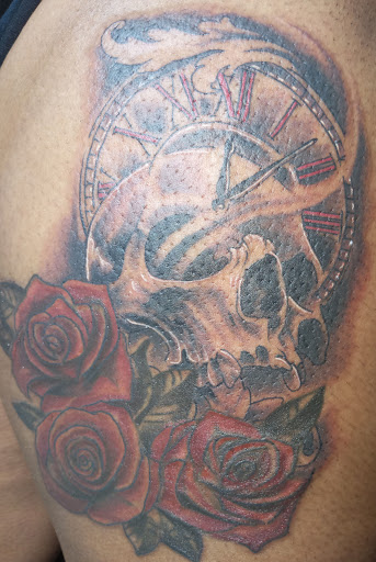 Explore small fine line tattoo ideas, creative tattoo ideas in Angola, available at Hoodlum Ink