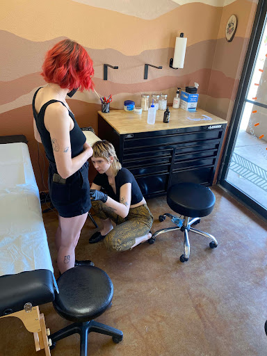 Explore lower arm sleeve tattoo ideas, creative tattoo ideas in Carefree, available at Lucid Arts - Design & Tattoo