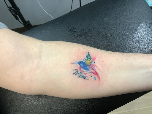 Explore tattoo ideas inside bicep, creative tattoo ideas in Whitehall, available at Beachside Tattoos & Smoke Shop