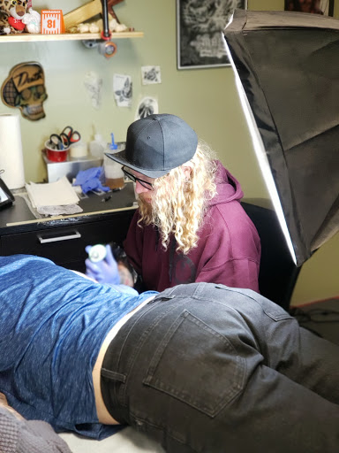 Find best friend tattoo idea for your next unique tattoo in Odessa at Heart And Dagger Tattoo