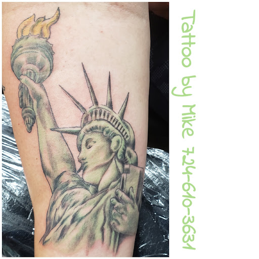 Explore women's arm sleeve tattoo ideas, creative tattoo ideas in Latrobe, available at Wicked Hart Tattoo