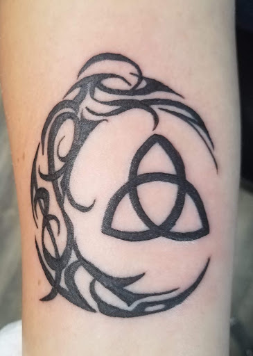 Explore dog tag tattoo ideas, creative tattoo ideas in Athens, available at United Ink Tattoos and Body Piercings