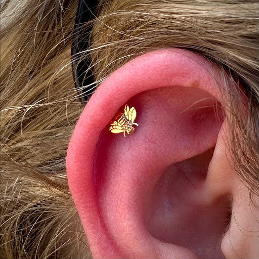 Explore bob's burgers tattoo ideas, creative tattoo ideas in Clawson, available at Green Light Body Piercing