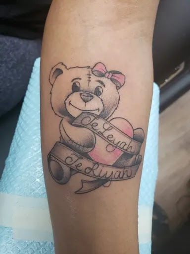 Explore davinci tattoo ideas, creative tattoo ideas in Canton, available at Couture Tattoo and Body Piercing