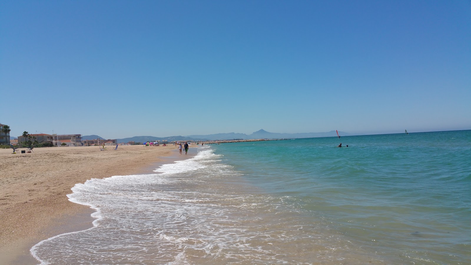 Foto av Playa el Vergel med grönt vatten yta