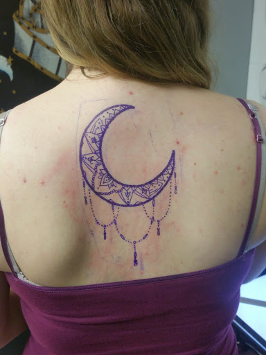 Explore bass clef tattoo ideas, creative tattoo ideas in Longview, available at Fugis Tattoo Shop