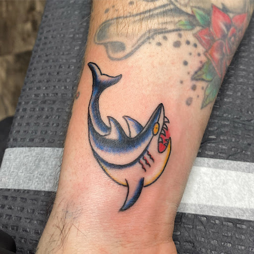 Explore flower foot tattoo ideas, creative tattoo ideas in Charleston, available at The Edge Tattoo Studio