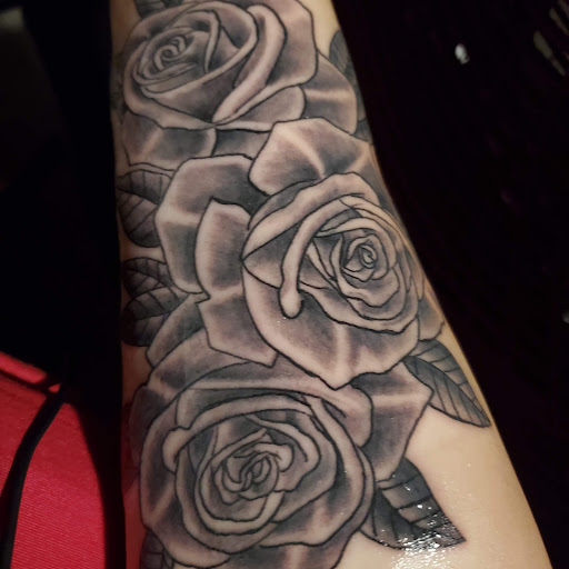 Explore mens sleeve tattoo ideas with meaning, creative tattoo ideas in Flora, available at Fat Kid Ink