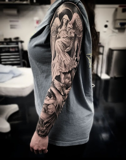 Explore cloud sleeve tattoo ideas, creative tattoo ideas in Buford, available at Inked Arts Tattoo Studio