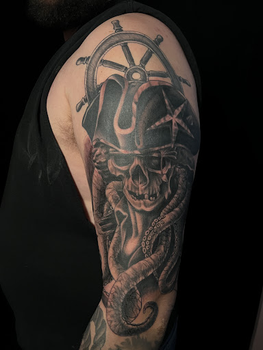 Explore viking tattoo ideas for men, creative tattoo ideas in New Richmond, available at Inkjunki LLC