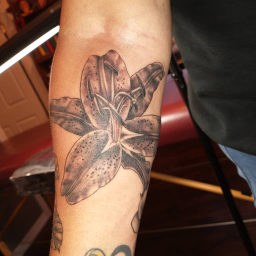 Explore cover up sleeve tattoo ideas, creative tattoo ideas in Seattle, available at Good Times Tattoo