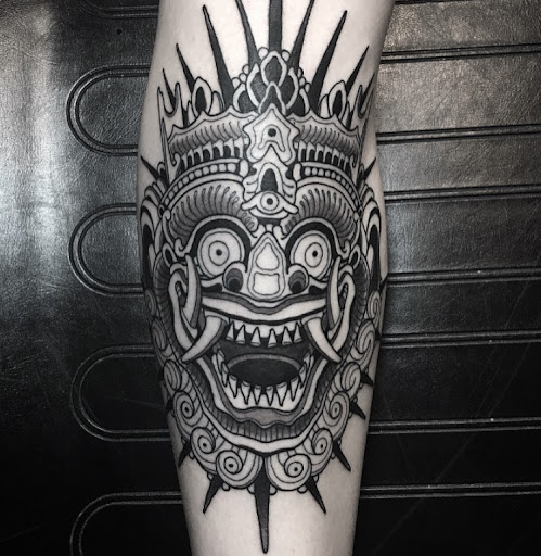 Explore kissing lips tattoo ideas, creative tattoo ideas in Stevens Point, available at Black Rabbit Tattooing