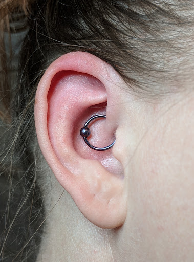 Explore tattoo cover up ideas for forearm, creative tattoo ideas in Kansas City, available at Supernatural Body Piercing