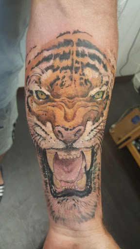 Tattoo Shop «Tiger Tattoos and Body Piercing», reviews and photos, 4145 W Vine St, Kissimmee, FL 34741, USA