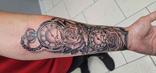 Explore patriotic tattoo sleeve ideas, creative tattoo ideas in Ocoee, available at Slaughterized Ink Tattoo and Piercing Studio