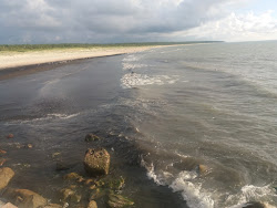 Foto von Pavilostas pludmale II mit türkisfarbenes wasser Oberfläche