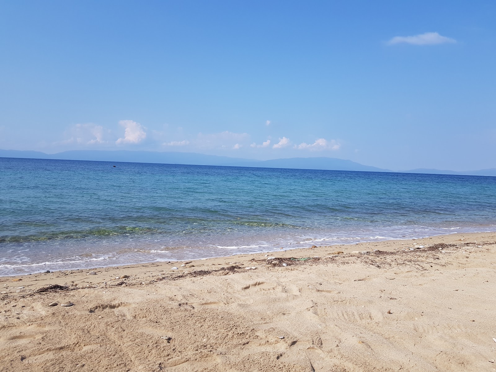 Foto di Orfano beach con una superficie del sabbia bianca