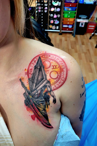 Explore easy cover up tattoo ideas, creative tattoo ideas in Benton, available at Spectrum Tattoo