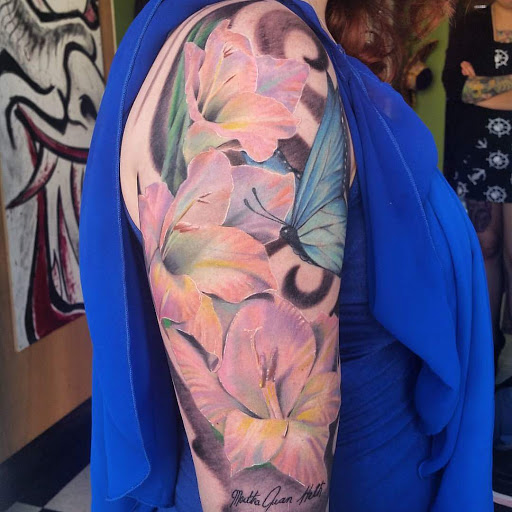 Find lesbian couple tattoos ideas for your next unique tattoo in Albuquerque at Custom Tattoo Co