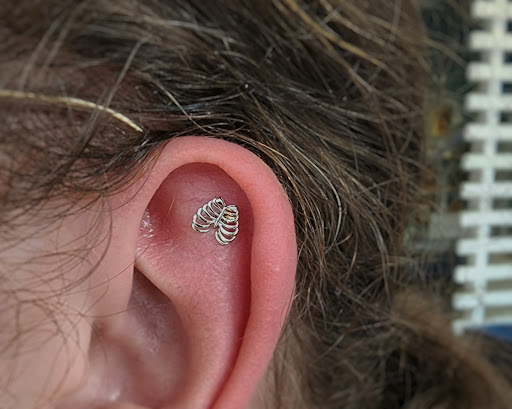 Explore deer hunting tattoo ideas, creative tattoo ideas in Toledo, available at Piercings by Caitlin presents Holier Toledo