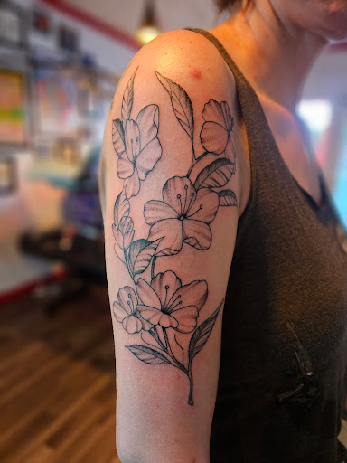 Explore owl tattoo ideas for females, creative tattoo ideas in Clarkston, available at Rogue Tattoo