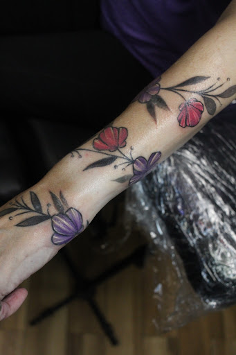 Explore family tattoo ideas with meaning, creative tattoo ideas in Homosassa, available at Citrus Tattoos