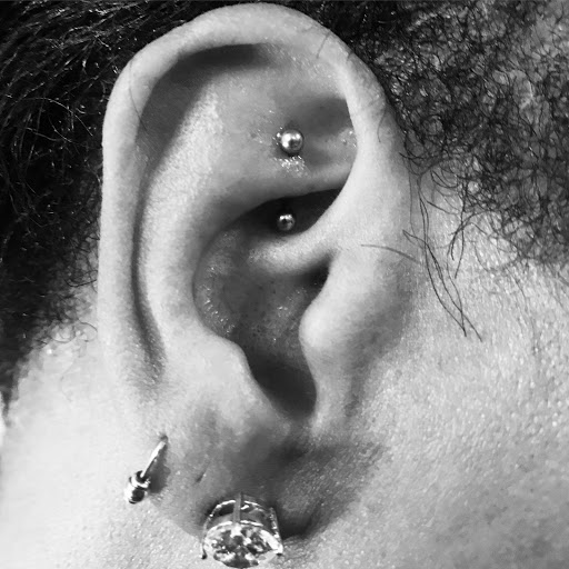 Explore dirtbike tattoo idea, creative tattoo ideas in Atlanta, available at Camp Creek Body Art & Laser