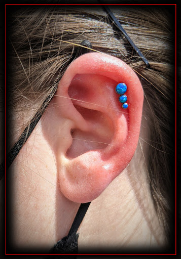 Explore vertical tattoo ideas, creative tattoo ideas in Fremont, available at Eternal Tattoo And Body Piercing