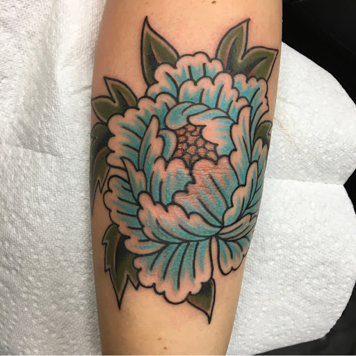 Explore motley crue tattoo ideas, creative tattoo ideas in Warrenville, available at UpRise Tattoos