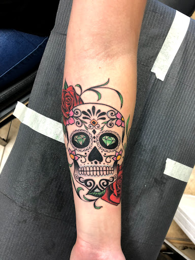 Explore book lover tattoo ideas, creative tattoo ideas in Pittsburg, available at Delta Art & Tattoo