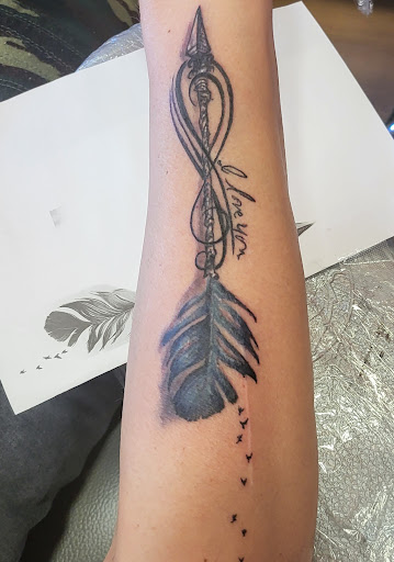 Explore neck and shoulder tattoo ideas, creative tattoo ideas in Wisconsin Dells, available at Alpha Red Tattoo & Barber Studio