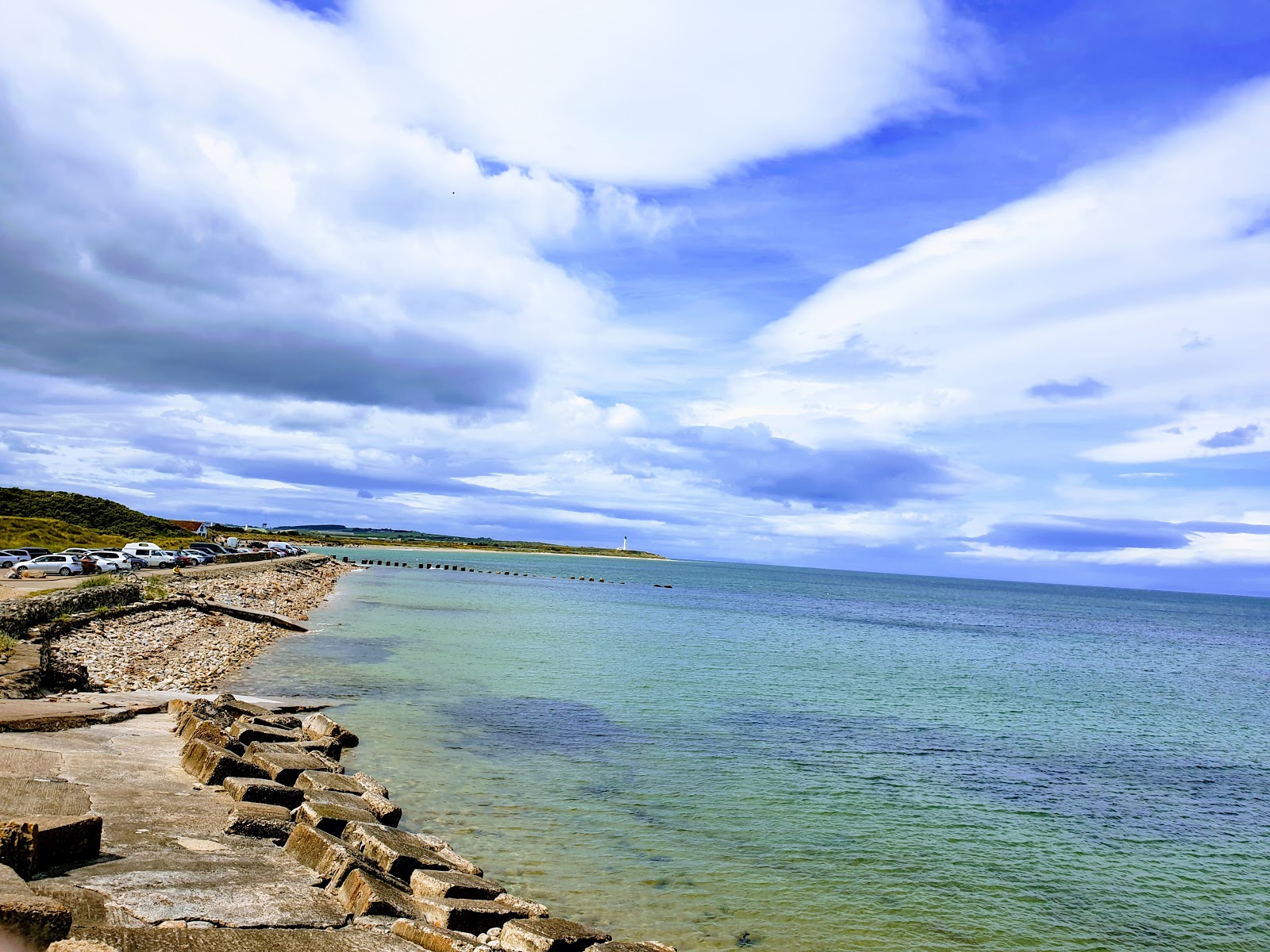 Foto van West Beach met recht en lang