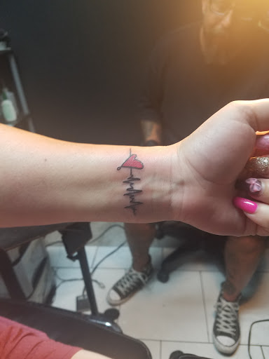 Explore tattoo ideas with husband's name, creative tattoo ideas in Orange Park, available at All Aces Tattoo and Body Piercing LLC