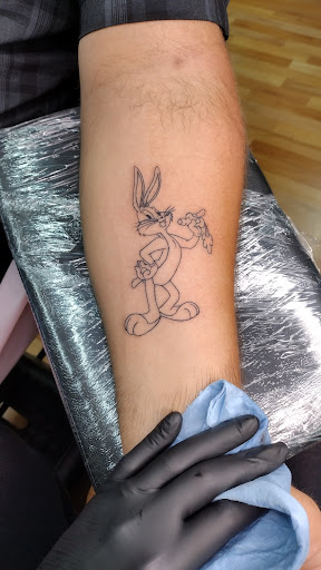 Explore forearm tattoo ideas small, creative tattoo ideas in Benton, available at Spectrum Tattoo